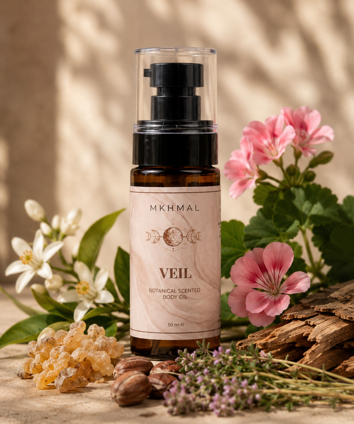 MKHMAL Veil botanical scented body oil bottle with flowers and herbs on a wooden surface